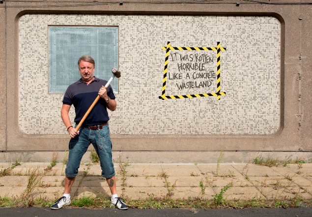 Peter Hook beside the inscription at the Orchards