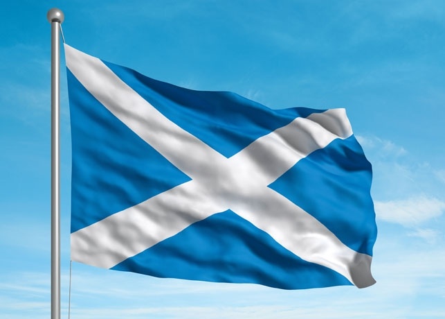 Scottish flag against sky background