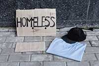 Homeless sign and cap